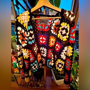 By Anthropologie crochet “granny squares” cardigan sweater. Handmade. One size.